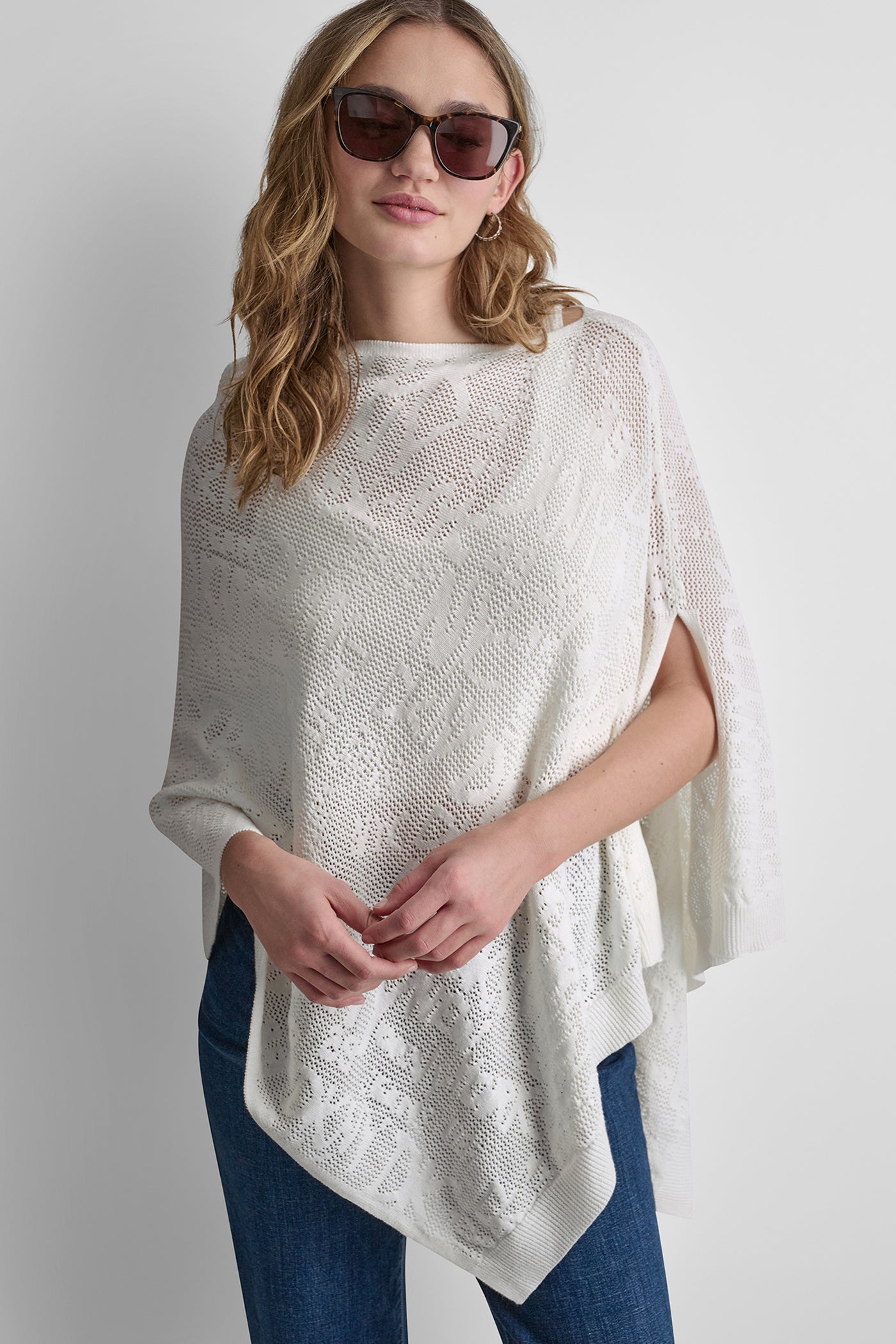 Ivory ASYMMETRIC LOGO POINTELLE PONCHO, VIEW 1 | Products