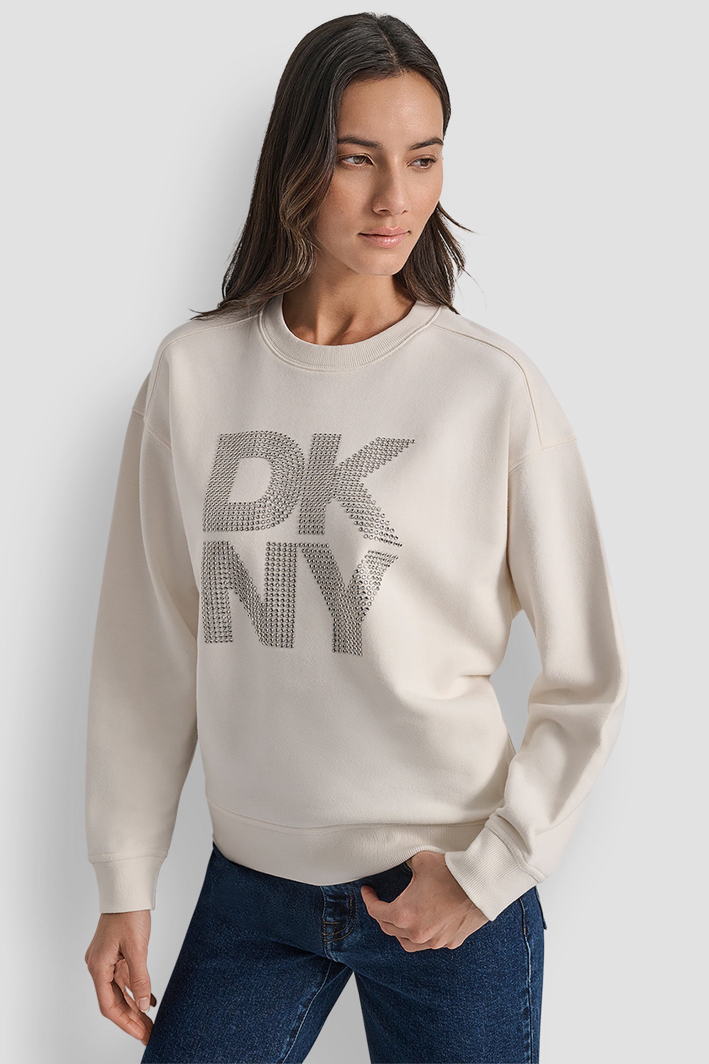 IVORY/GOLD DKNY STACKED METAL RIM RHINESTONE LOGO CREW NECK, VIEW 1 | New Arrivals