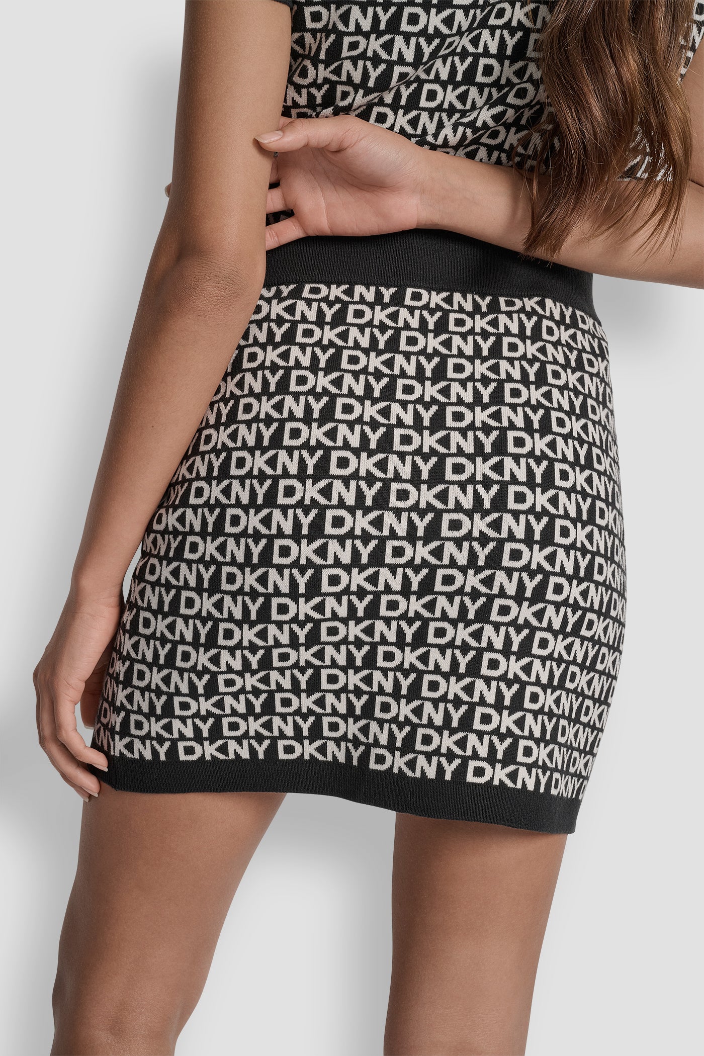 EGGNOG/BLACK LOGO JACQUARD SHORT SKIRT, BACK VIEW | Skirts
