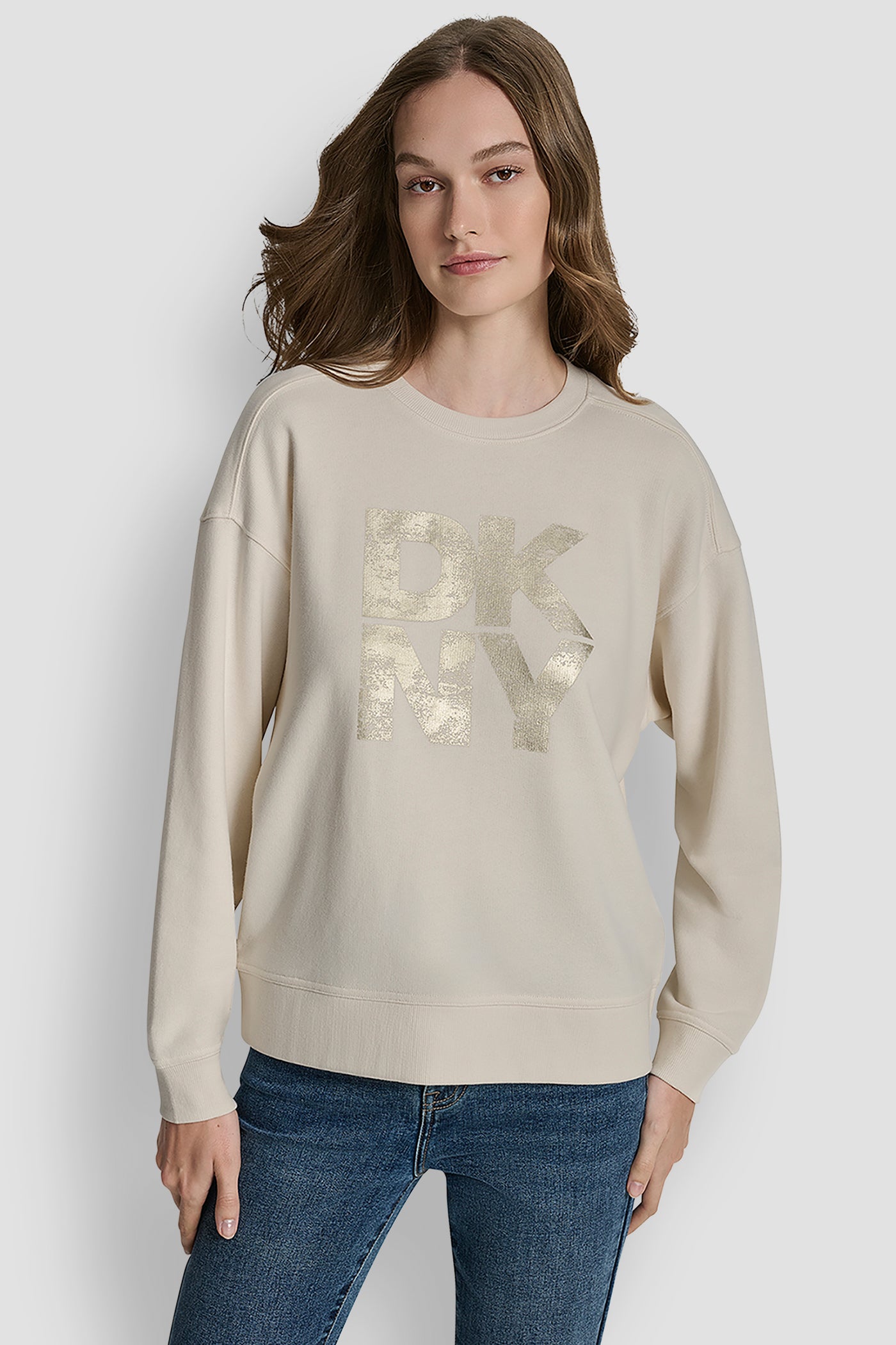 EGGNOG/LIGHT GOLD DISTRESSED DKNY FOIL LOGO SWEATSHIRT, FRONT VIEW | Under $75