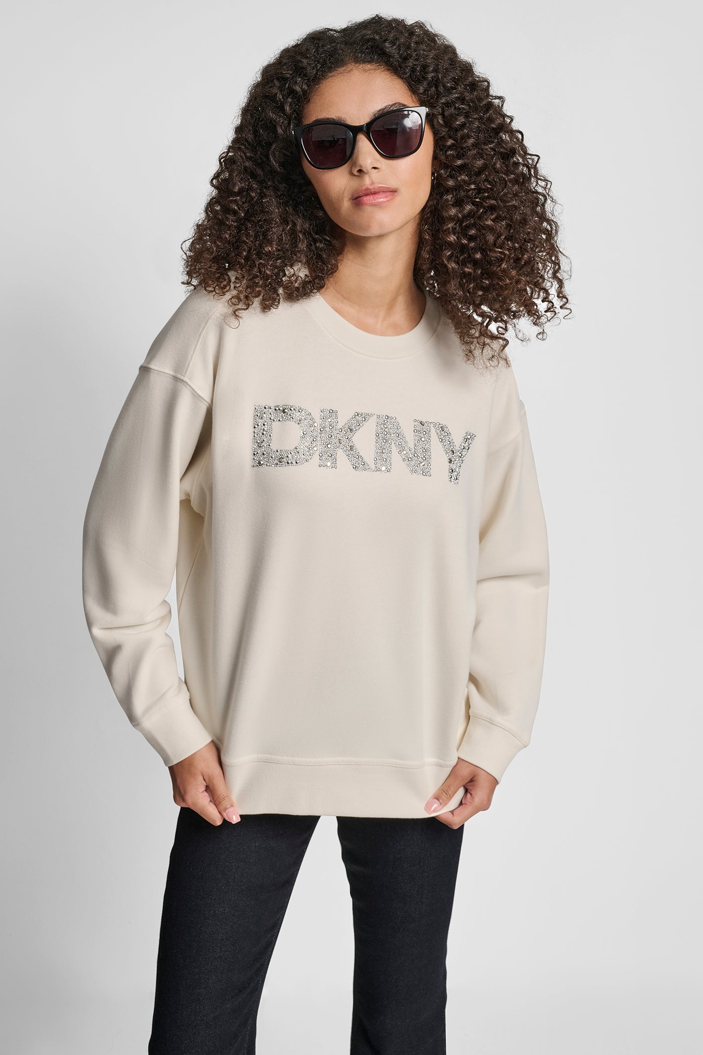 EGGNOG/SILVER DKNY RHINESTONE STUD LOGO CREW NECK SWEATSHIRT, VIEW 1 | Back-To-School Shop