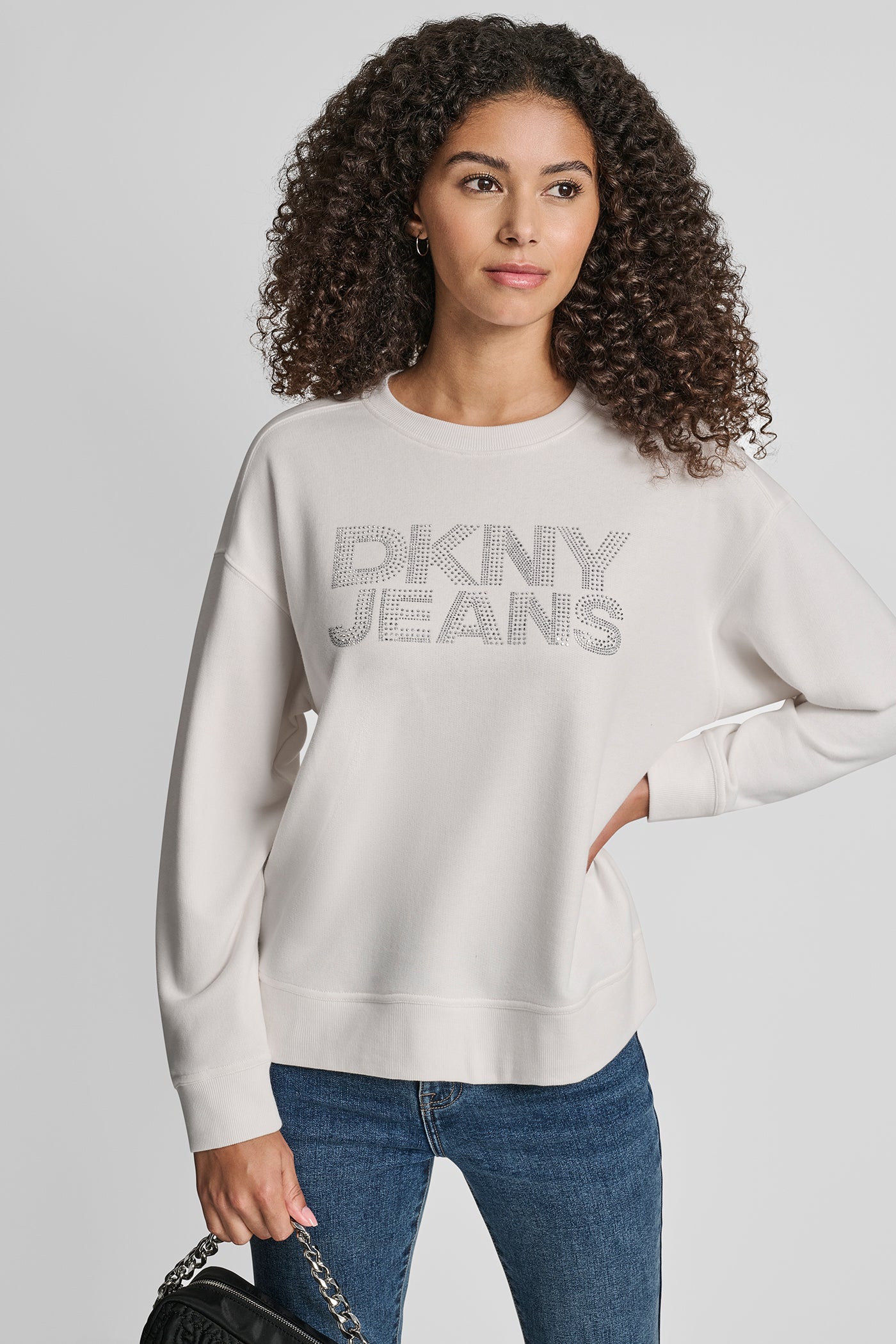 IVORY/SILVER DKNY RHINESTONE STUD LOGO CREW NECK SWEATSHIRT, VIEW 1 | Sweatshirts & Joggers