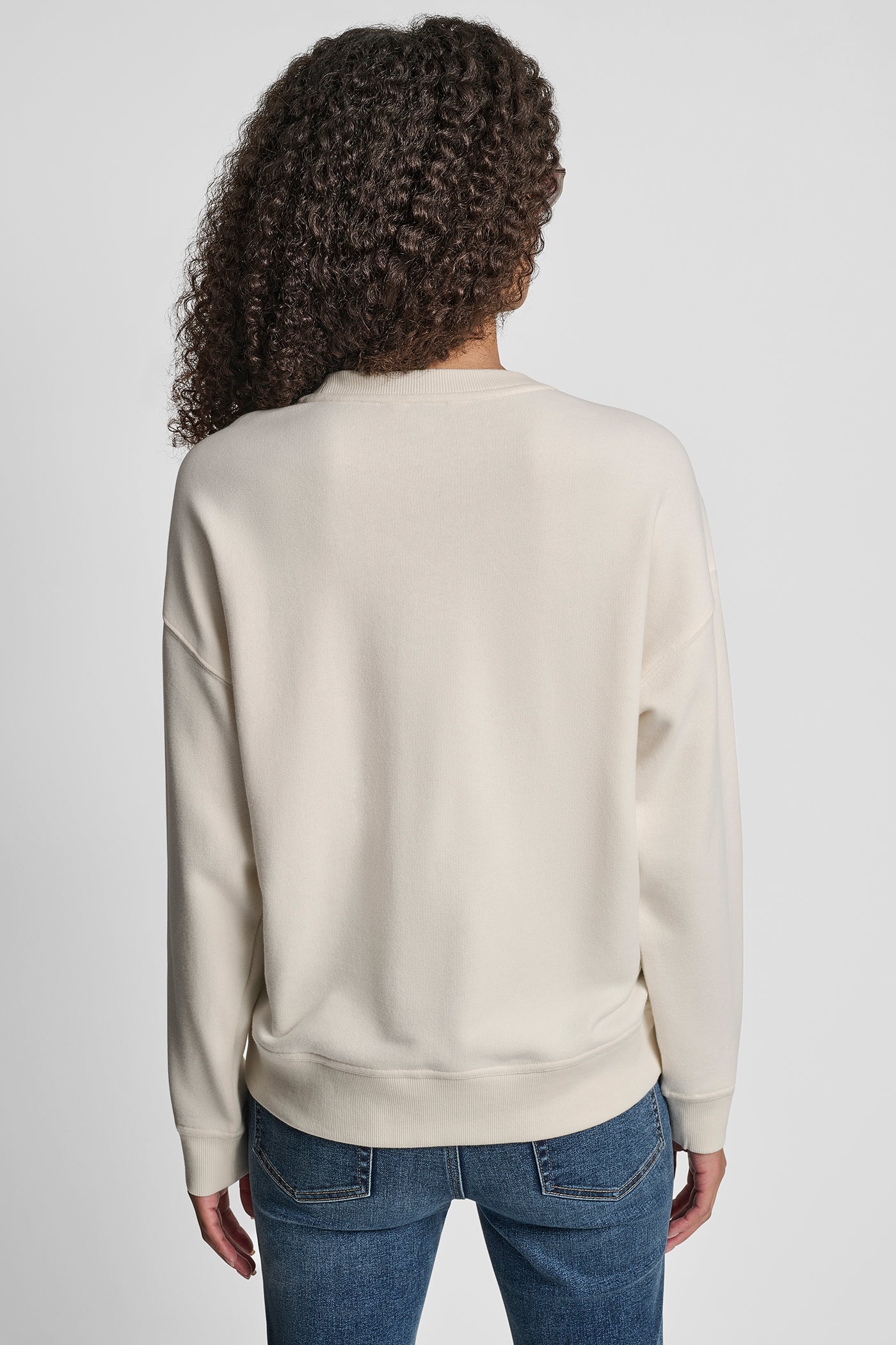 EGGNOG/CHAMPAGNE DKNY RHINESTONE STUD LOGO CREW NECK SWEATSHIRT, VIEW 2 | Sweatshirts & Joggers