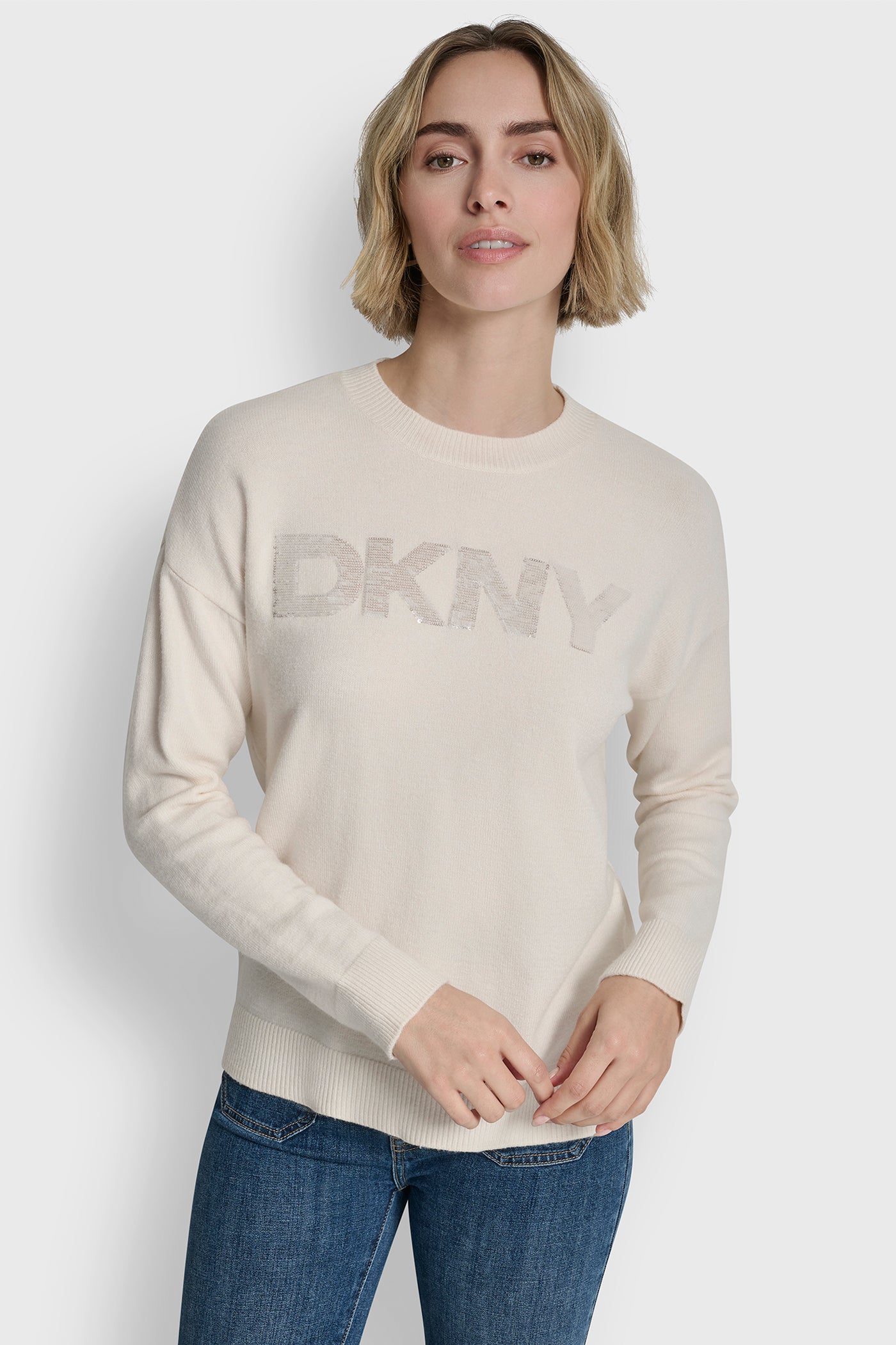 Eggnog SEQUIN LOGO EMBELLISHED SWEATER, FRONT VIEW | DKNY25