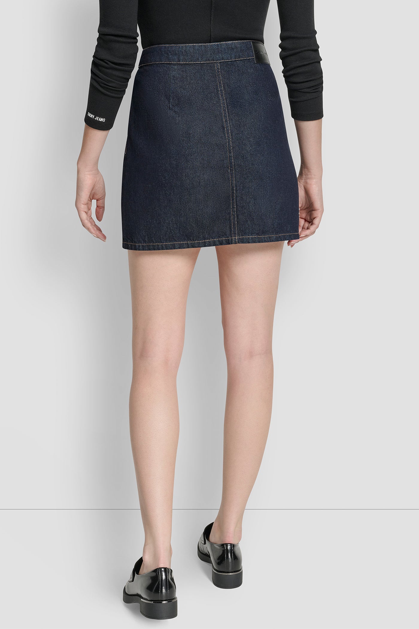 FEARLESS HIGH RISE BUTTON FRONT MINI SKIRT, BACK VIEW | Gifts Under $50