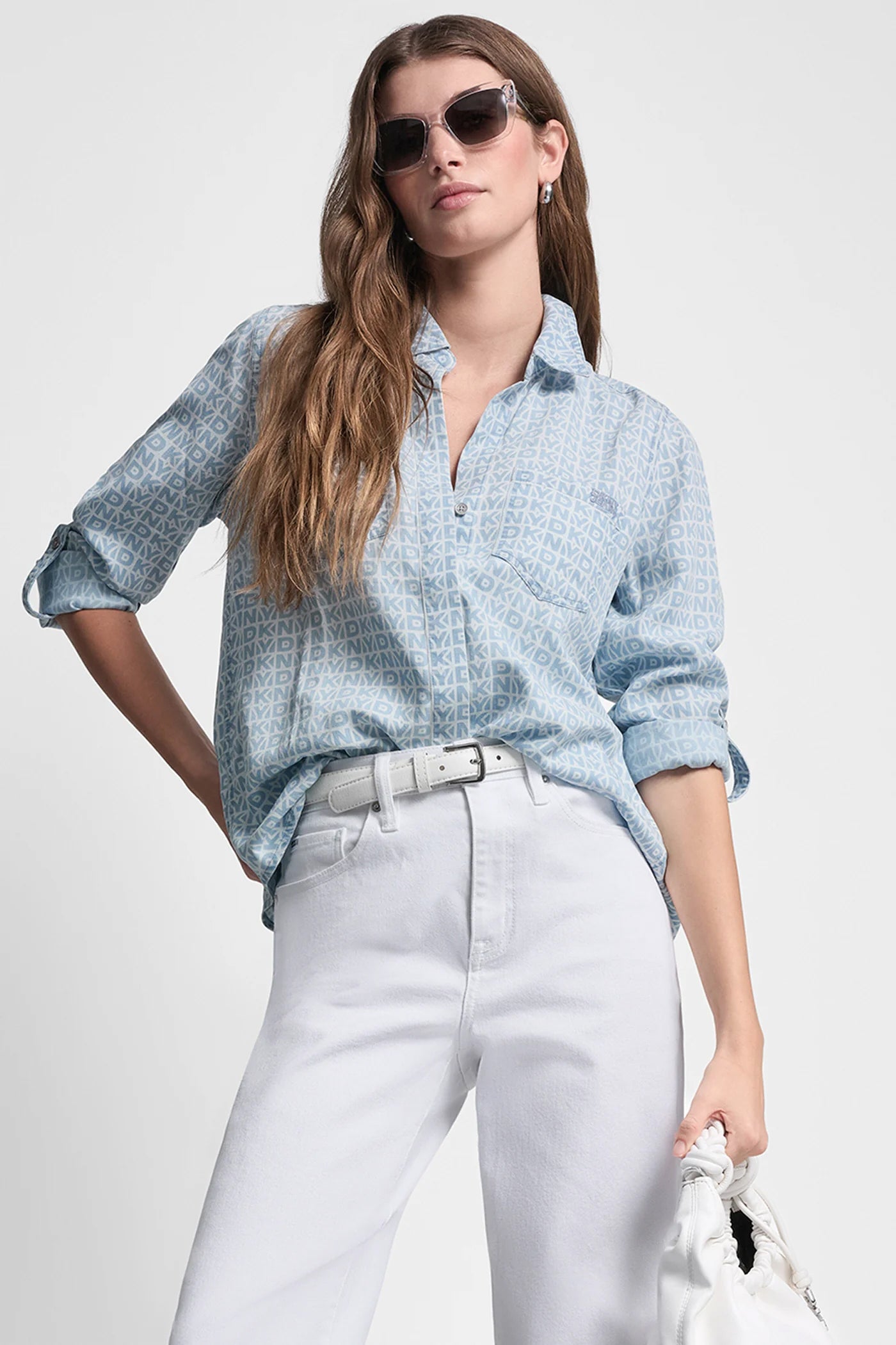 DKNY OUTLINE CHAMBRAY GARMENT DYE SPLIT BACK SHIRT, VIEW 1 | WOMEN'S SWEATERS & TOPS