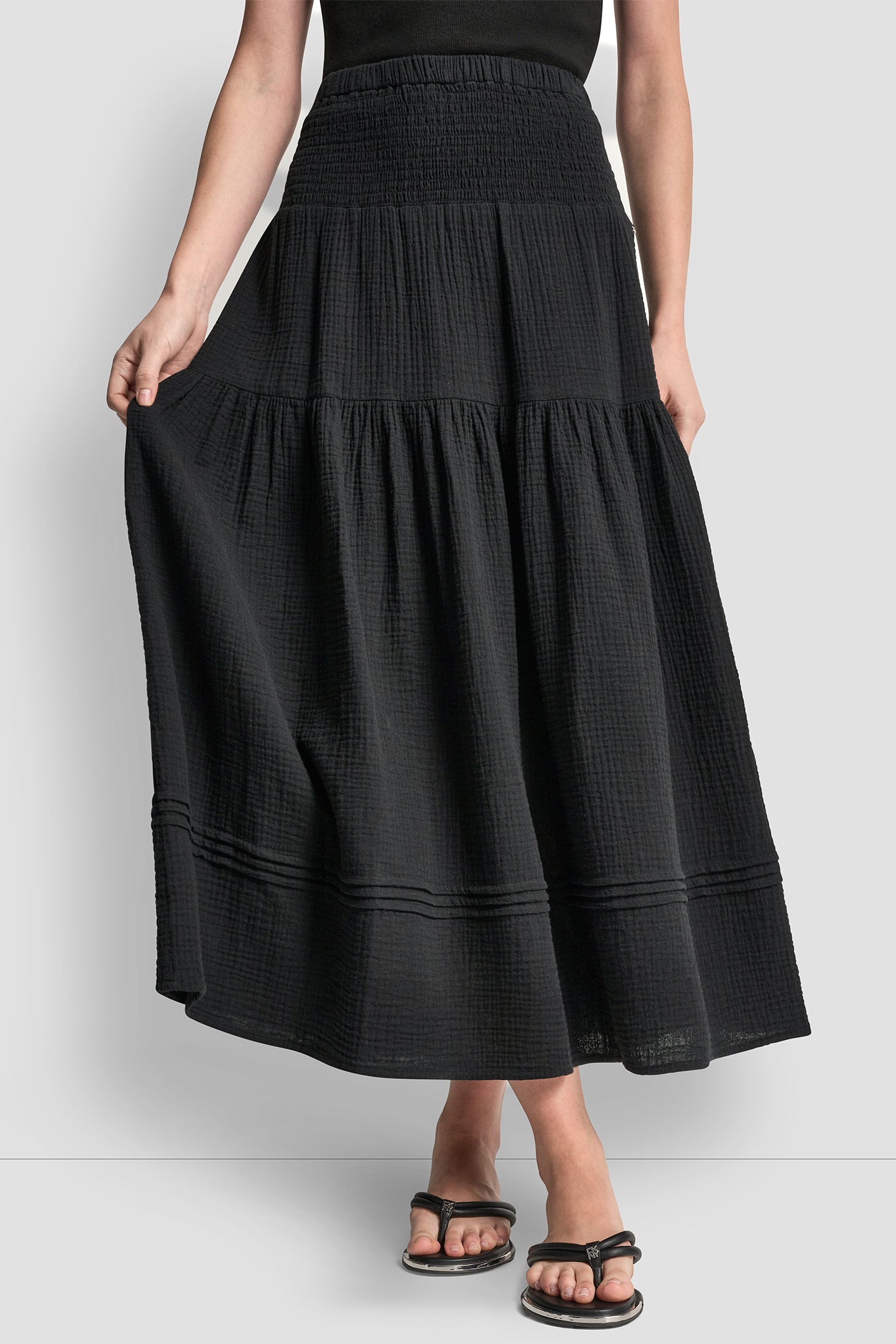 Black SMOCKED WAIST MAXI TIERED SKIRT, FRONT VIEW | The Vacation Edit