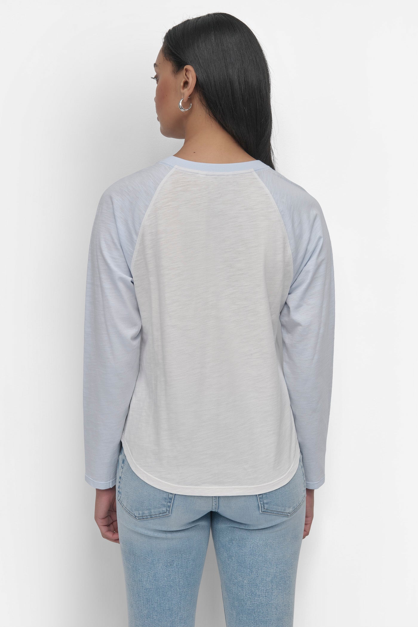 IVORY/SKYWAY BLUE ARCHED NEW YORK  LOGO RAGLAN LONG SLEEVE TEE, BACK VIEW | Products