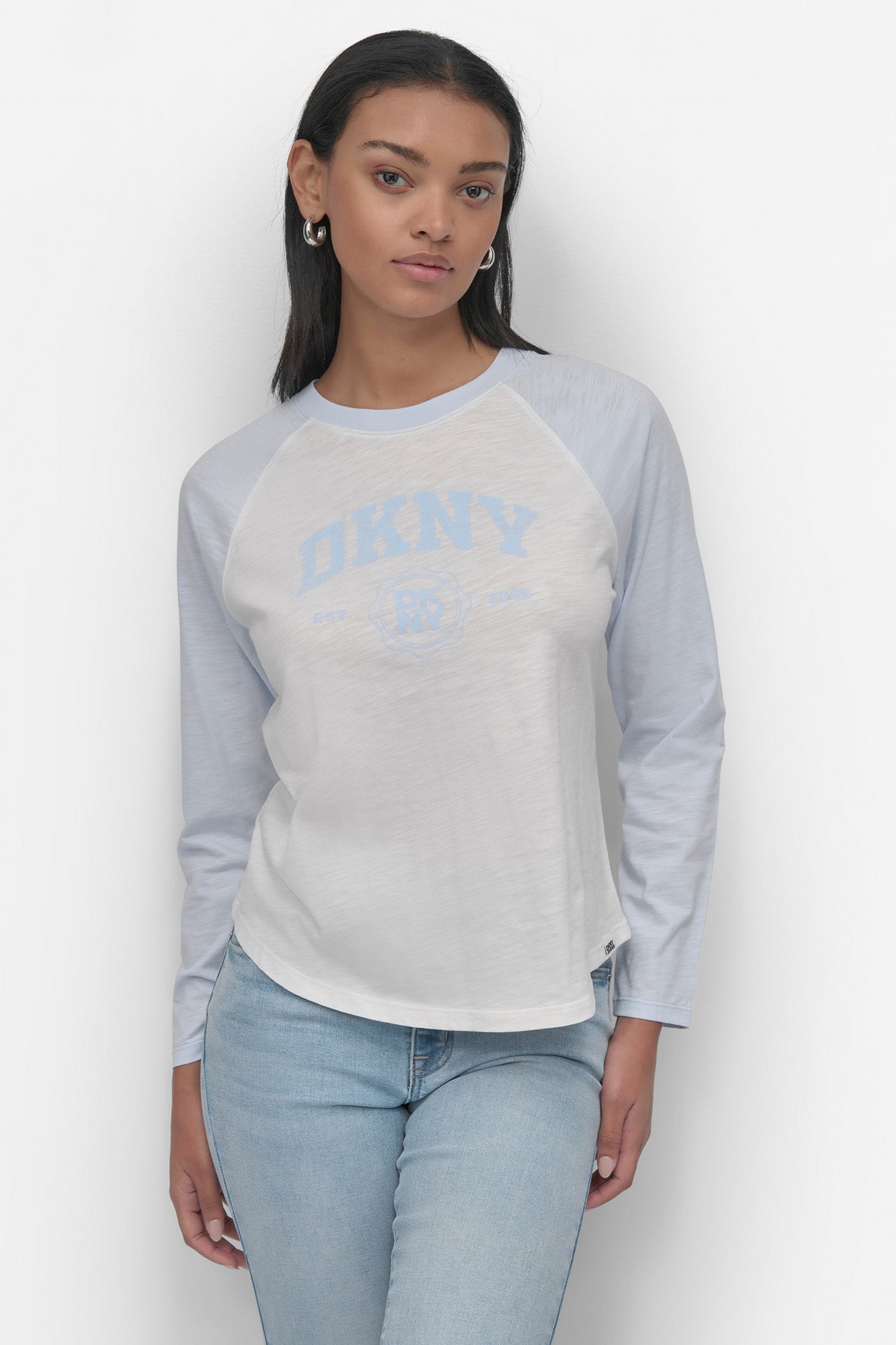 IVORY/SKYWAY BLUE ARCHED NEW YORK  LOGO RAGLAN LONG SLEEVE TEE, FRONT VIEW | Products