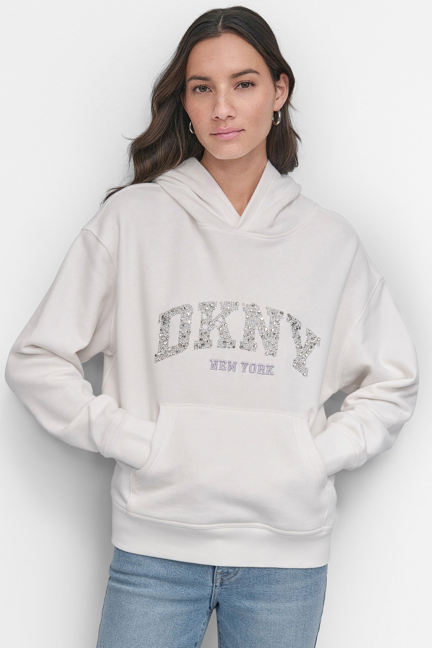WHITE/MATTE SILVER DKNY ARCHED DOME STUD SWEATSHIRT, VIEW 1 | SALE TOPS AND SWEATERS