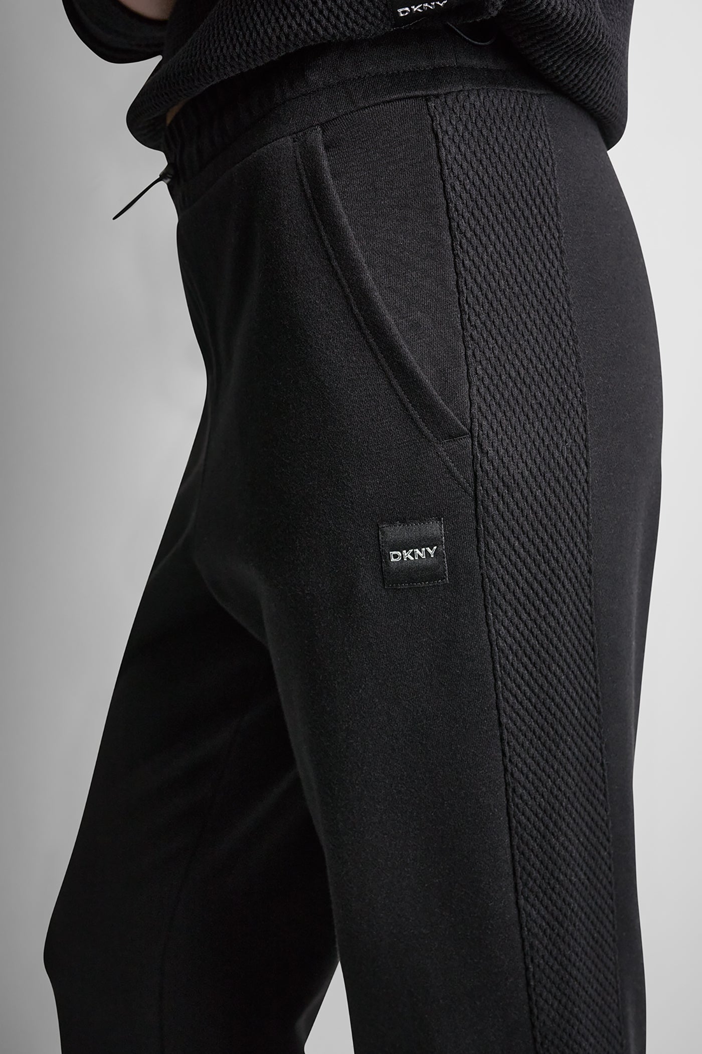 Black JACQUARD MIX HIGH-RISE ANKLE PANT, BACK VIEW | DKNY Sport