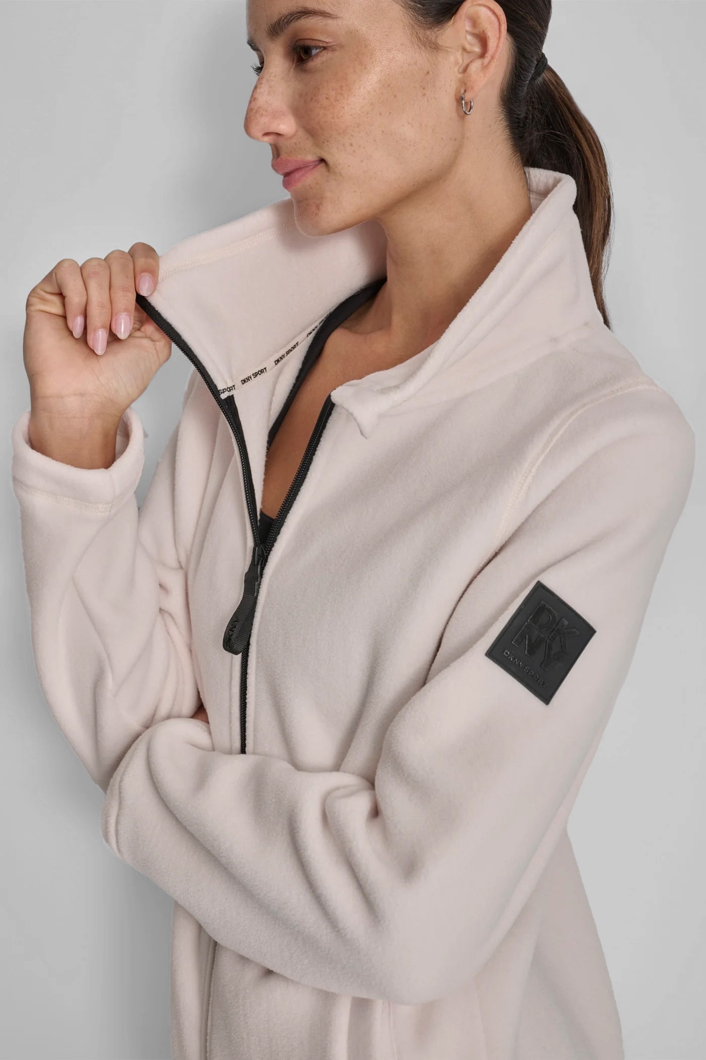 COCONUT TECH FLEECE JACKET WITH MATTE SHINE LOGO SLEEVE PATCH, VIEW 1 | DKNY Sport