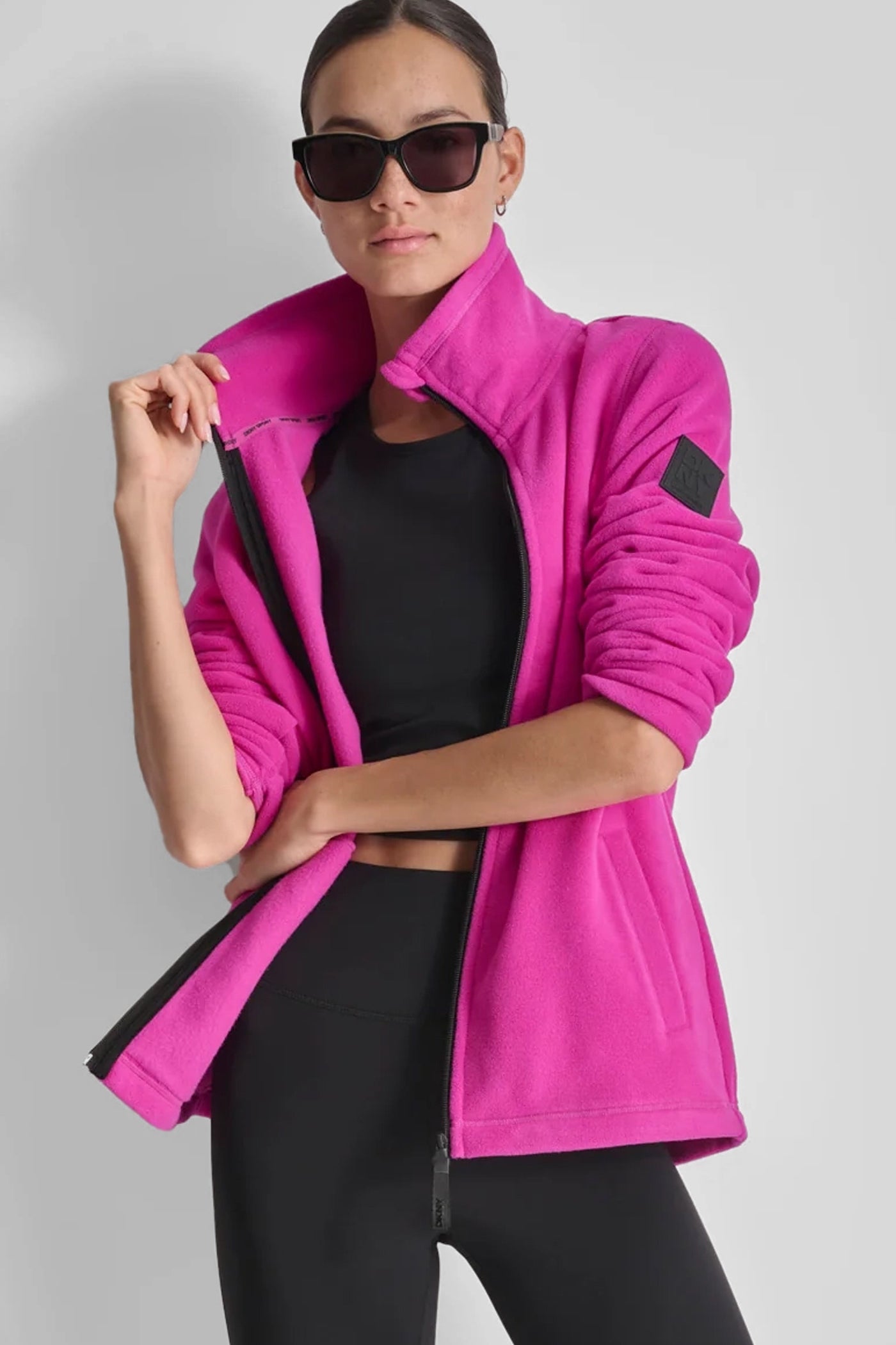 FESTIVE PINK/ BLACK TECH FLEECE JACKET WITH MATTE SHINE LOGO SLEEVE PATCH, VIEW 1 | Back-To-School Shop