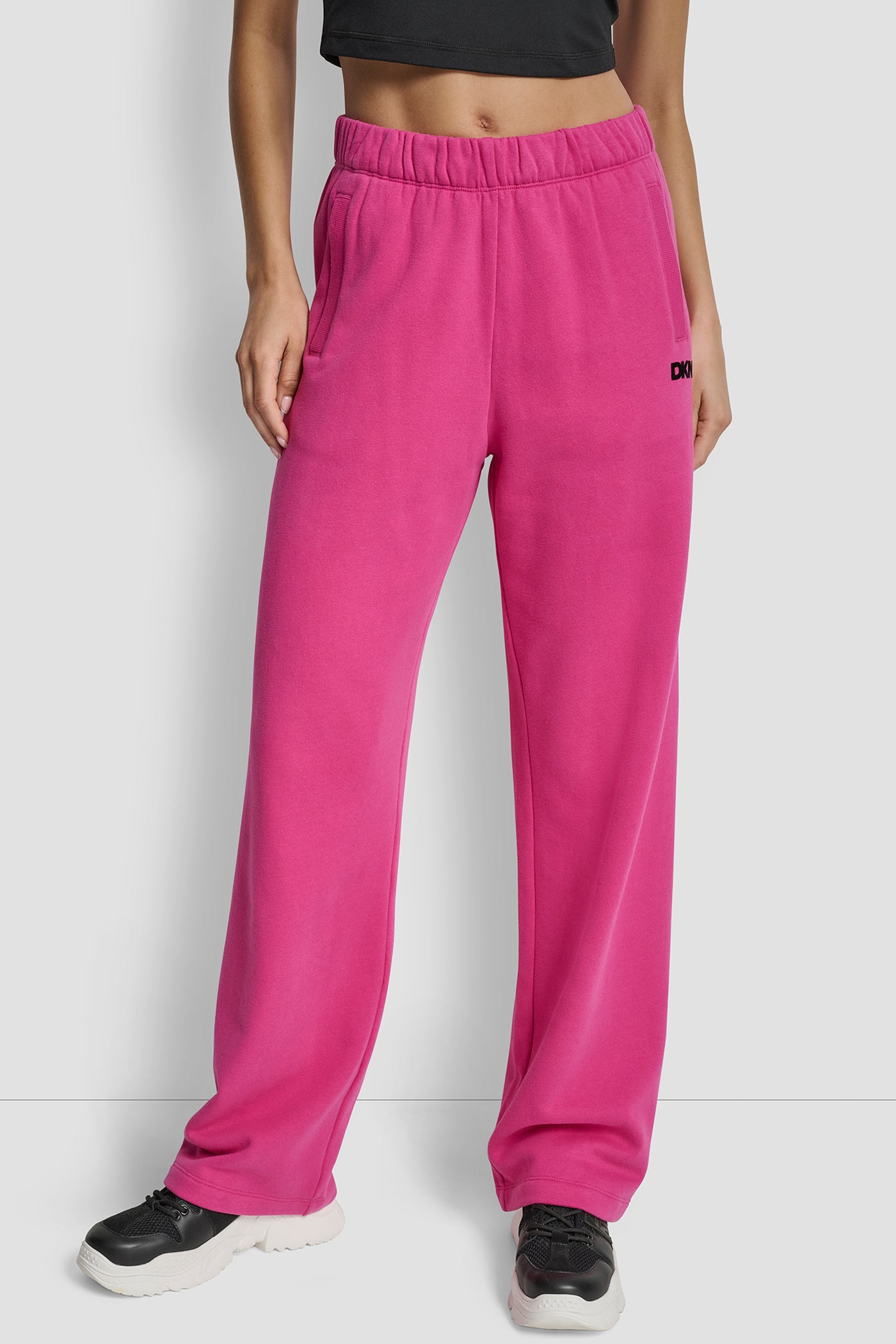FESTIVE PINK FLOCKED LOGO BOYFRIEND OPEN LEG PANT WITH POCKETS, FRONT VIEW | DKNY Sport