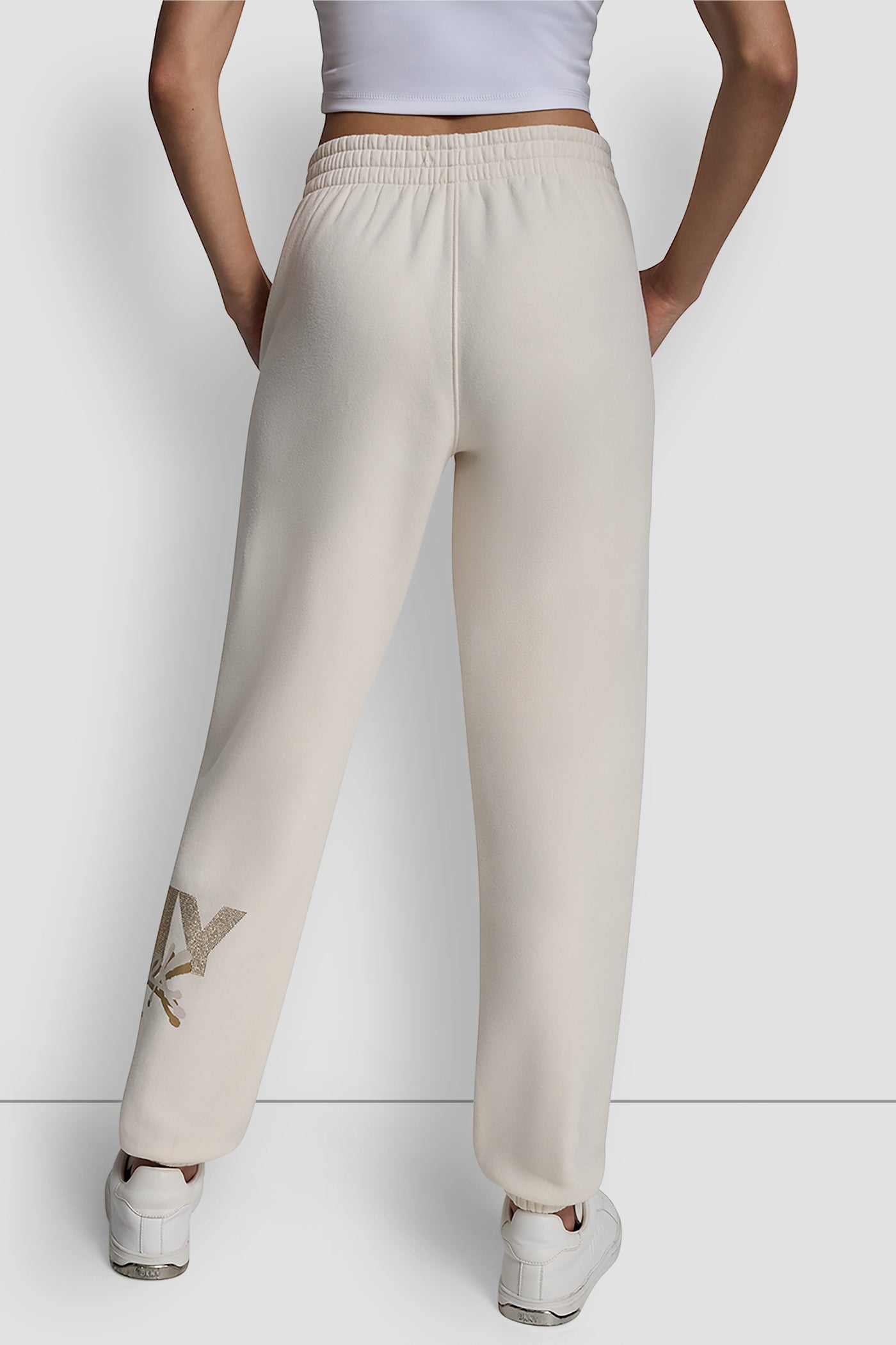 EGGNOG/ LIGHT GOLD GRAFFITI RHINESTONE LOGO HIGH RISE RELAXED FIT JOGGER, BACK VIEW | Clothing