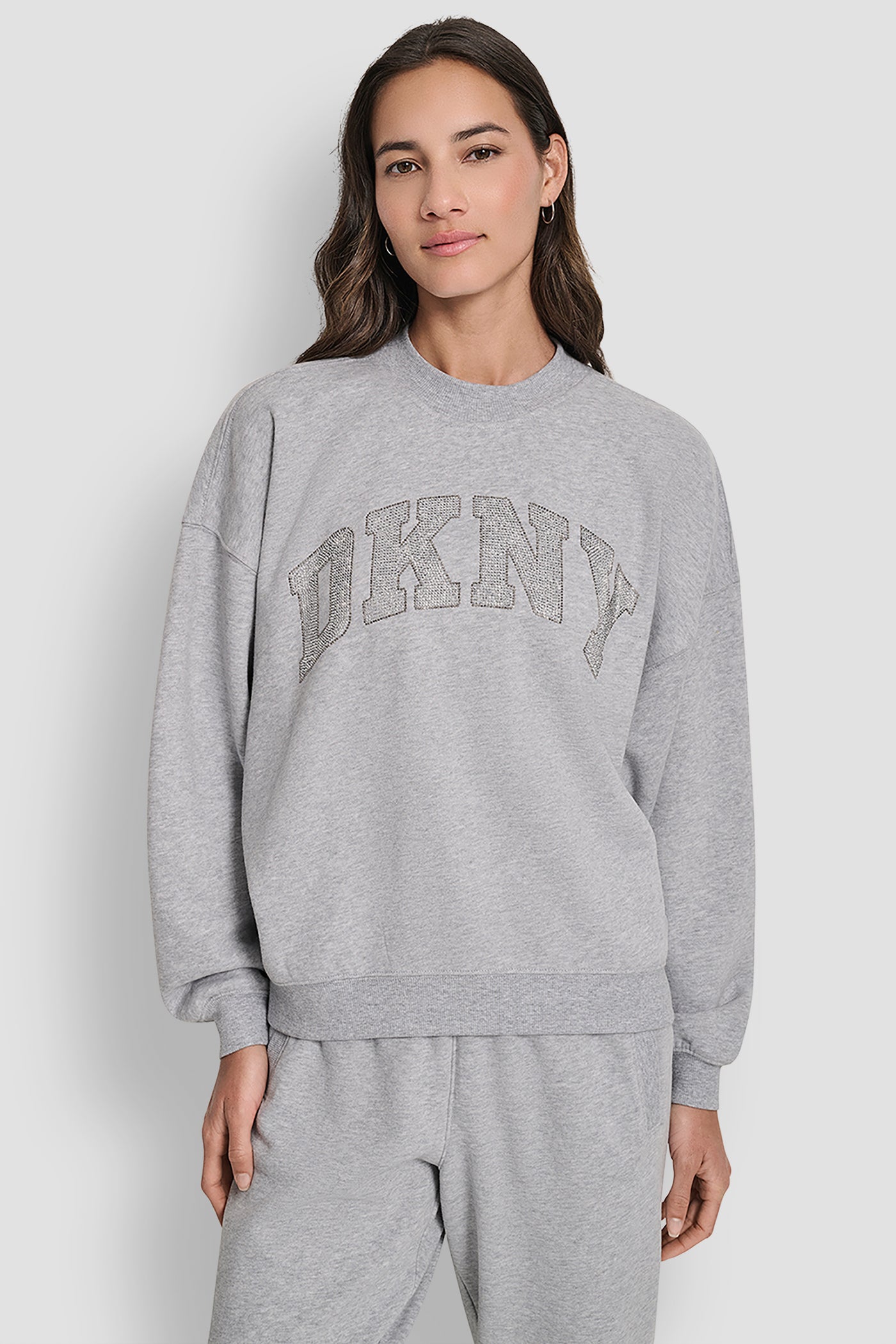 PEARL GREY HEATHER EXPLODED RHINESTONE VARISTY LOGO PULLOVER, FRONT VIEW | DKNY Sport