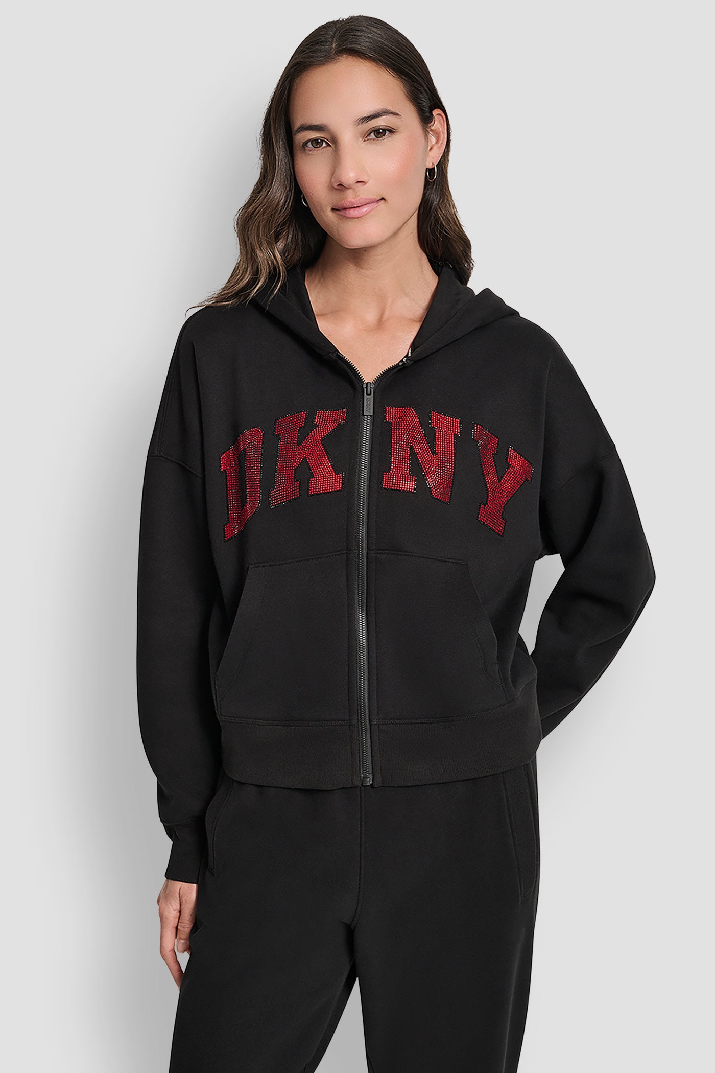 BLACK/CITY CRIMSON EXPLODED RHINESTONE VARISTY LOGO FULL ZIP HOODIE WITH POCKETS, VIEW 1 | DKNY Sport