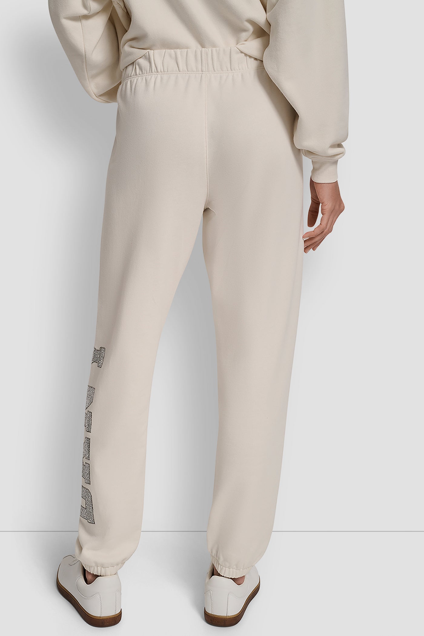 EGGNOG EXPLODED RHINESTONE VARISTY LOGO HIGH RISE RELAXED, BACK VIEW | DKNY Sport
