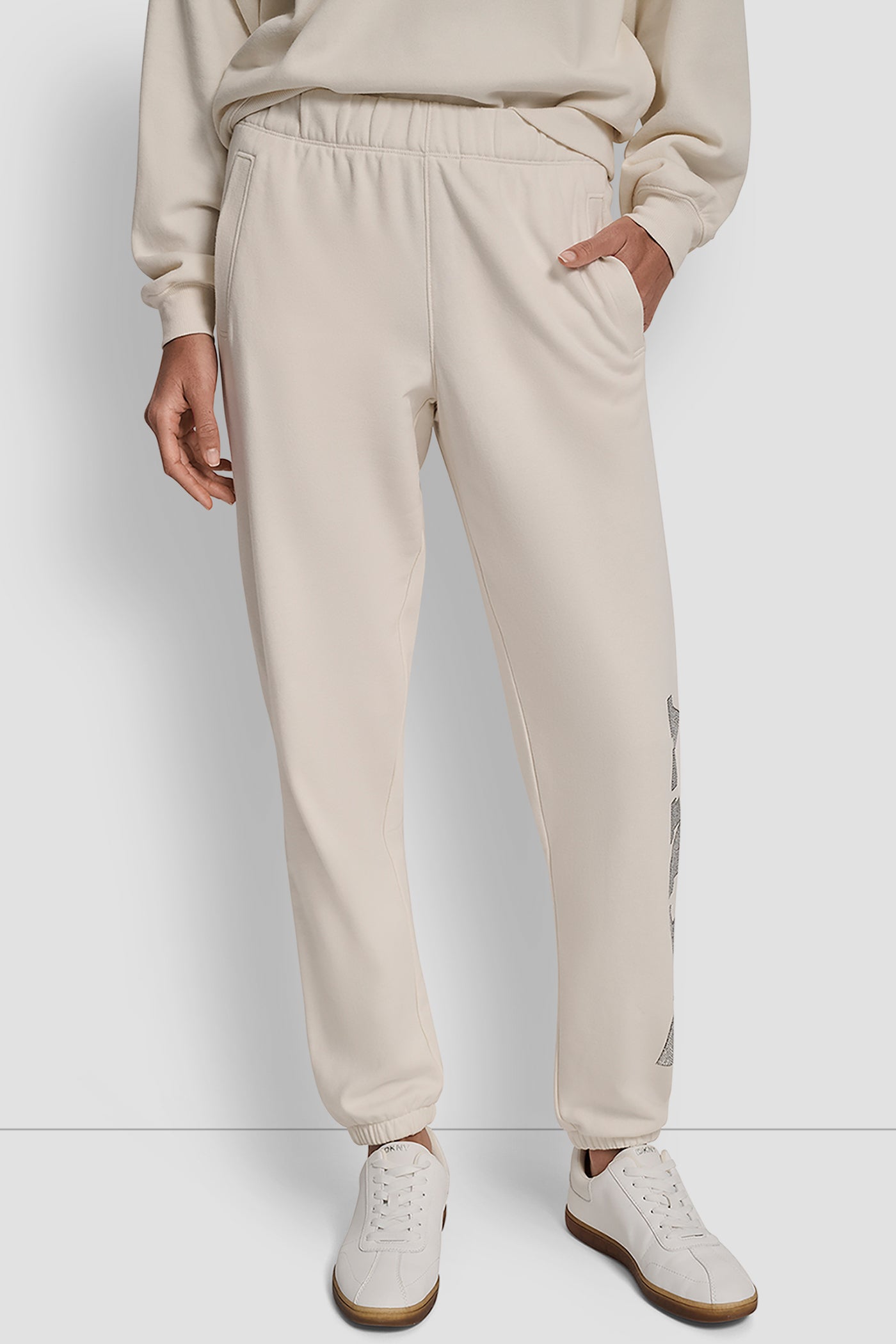 EGGNOG EXPLODED RHINESTONE VARISTY LOGO HIGH RISE RELAXED, FRONT VIEW | DKNY Sport