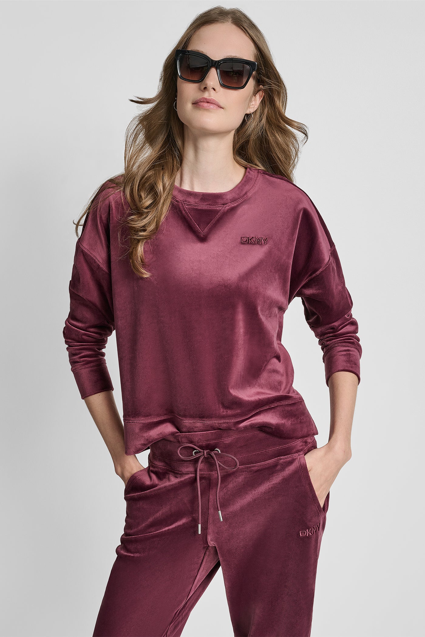 SYRAH HIGH LOW CREW NECK V-INSET PULLOVER WITH EMBROIDERY, VIEW 1 | DKNY Sport