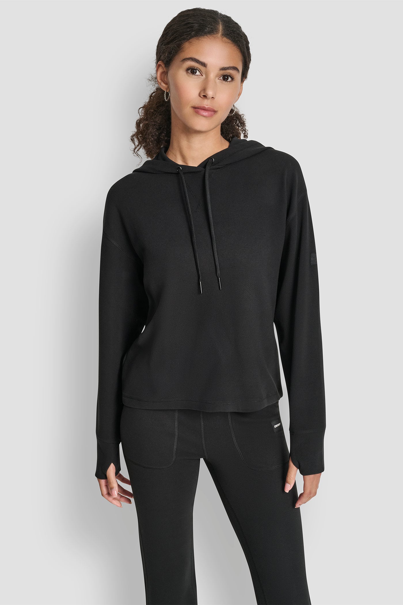 Black TRANSCEND THERMAL V-INSET HOODIE, FRONT VIEW | DKNY Promo