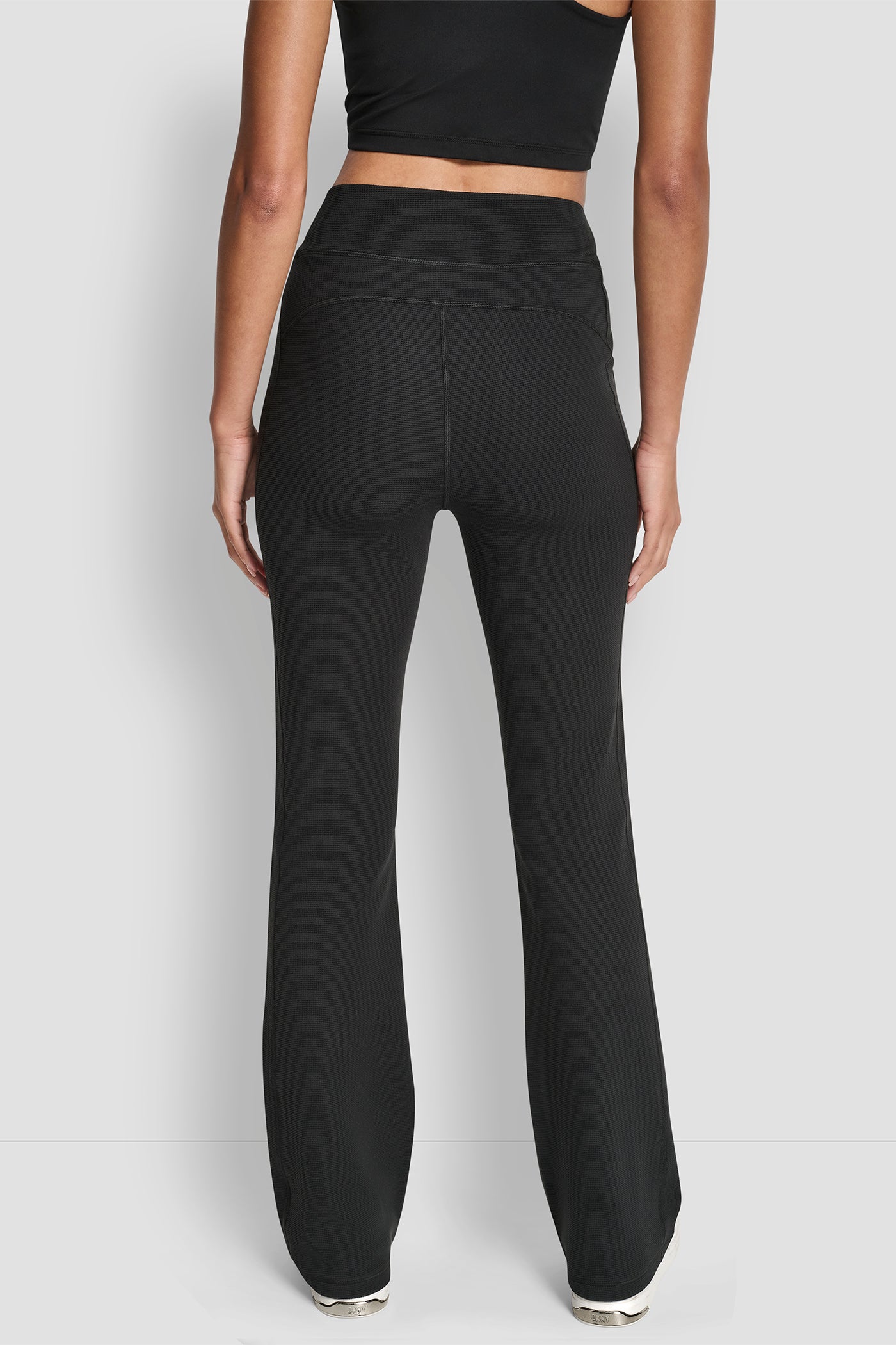 Black TRANSCEND THERMAL HIGH WAIST FLARE PANT WITH POCKET, BACK VIEW | New Arrivals