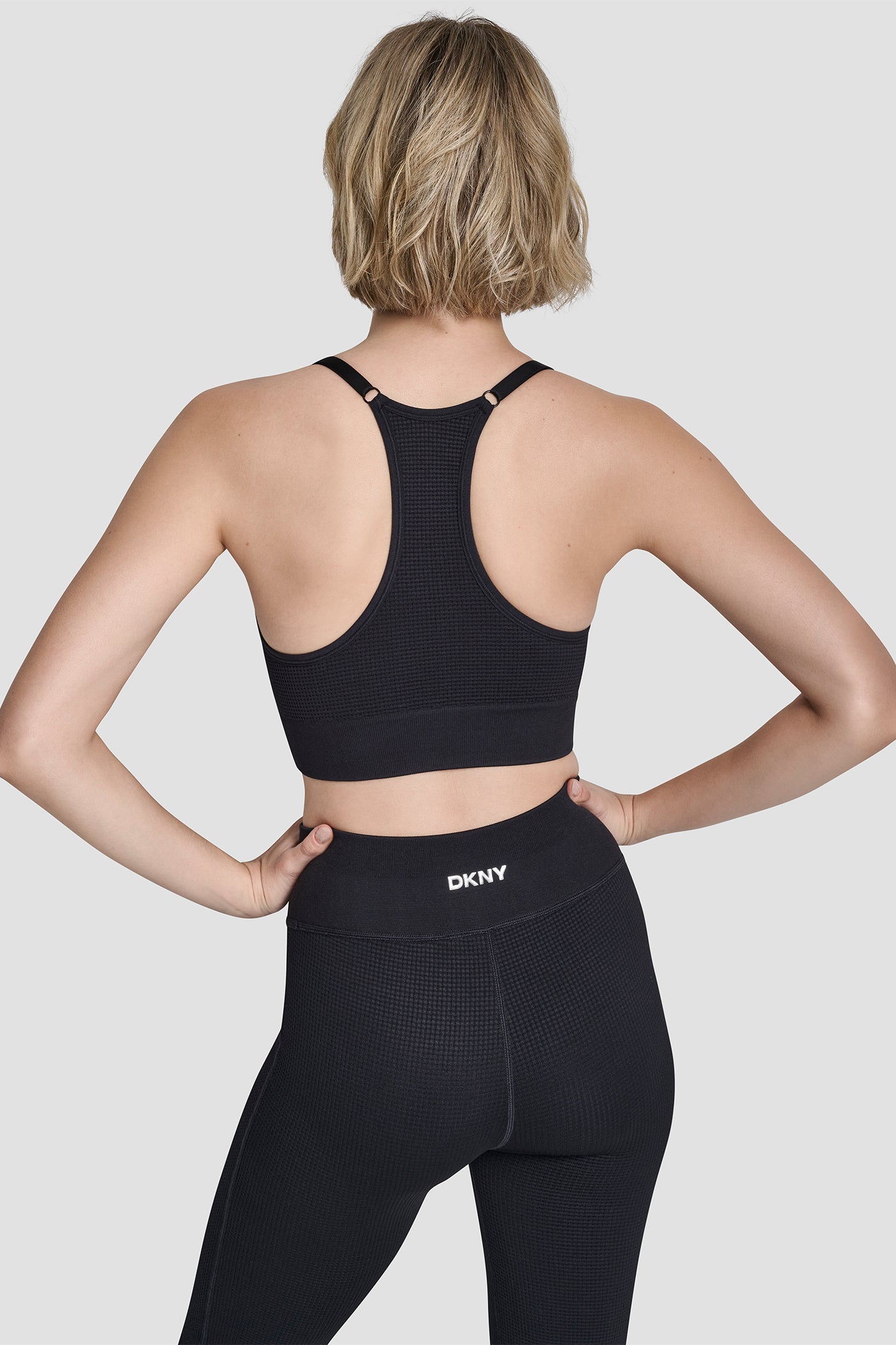 Black SEAMLESS RACERBACK BRA, BACK VIEW | Clothing
