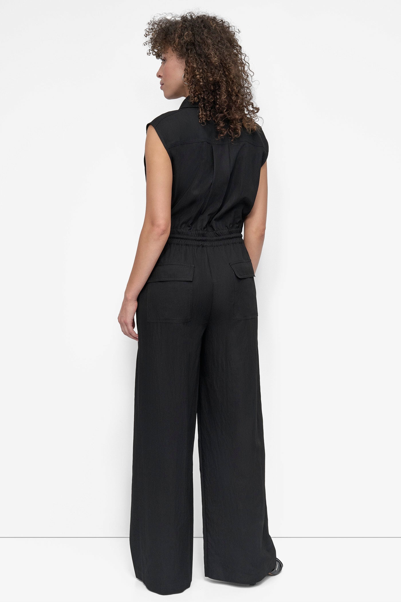 Black SLEEVELESS UTILITY JUMPSUIT, BACK VIEW | 9-5 Edit